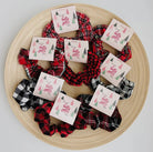 Holiday Jolly Era Spirit Plaid Scunchie-Hair Accessories-ultimatehousebuyers-ultimatehousebuyers, Women's Fashion Boutique in Grinnell, Iowa